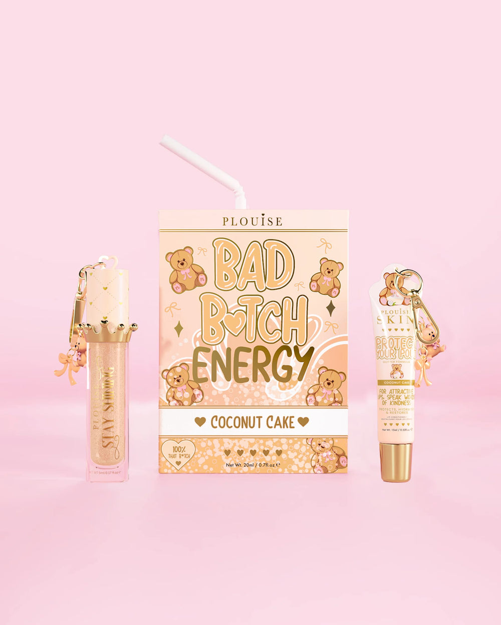 P.Louise Teddy Glitter Bad Bitch Energy Lip Duo o zapachu ciasta kokosowego, zawierający odżywkę do ust i olejek do ust na różowym tle