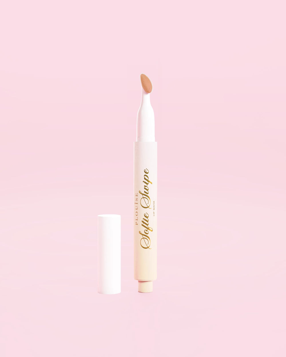Zdjęcie przedstawiające maskę do ust P.Louise Softie Swipe Tinted Lip Mask w odcieniu Barely There na różowym tle
