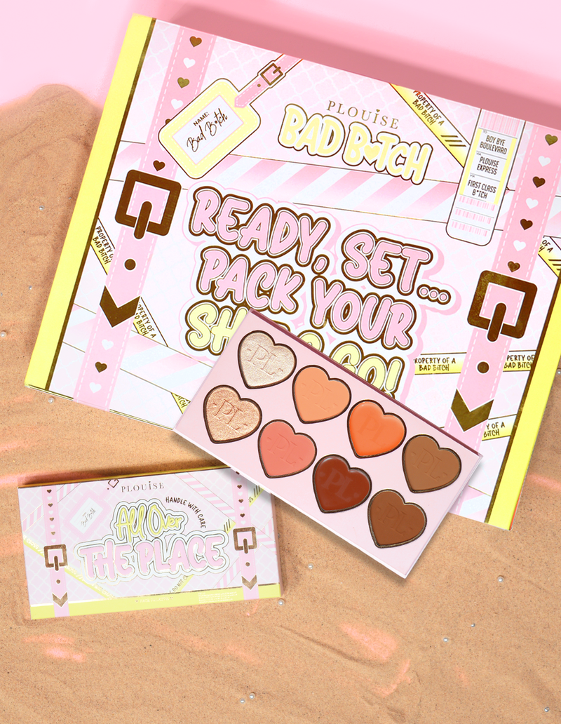 Opakowanie i produkt P.Louise All Over The Place Face Palette z abażurami w kształcie serca w różnych kolorach na podłożu z piasku.