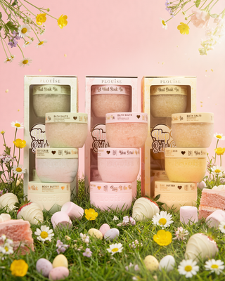 Three sets of the Hop Into Self-Care Bath & Body Trio in 3 Easter scents