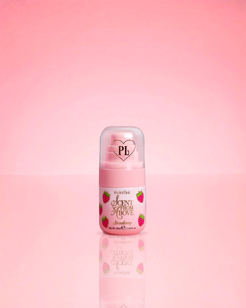 P.Louise Mini Strawberry Mgiełka do włosów i ciała z góry na różowym tle
